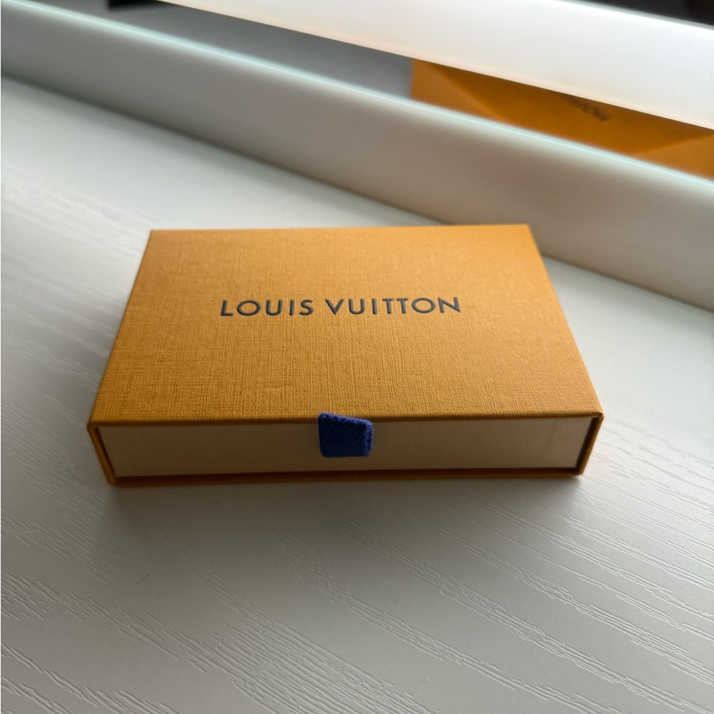 Louis Vuitton Saffron Box with Blue Tab